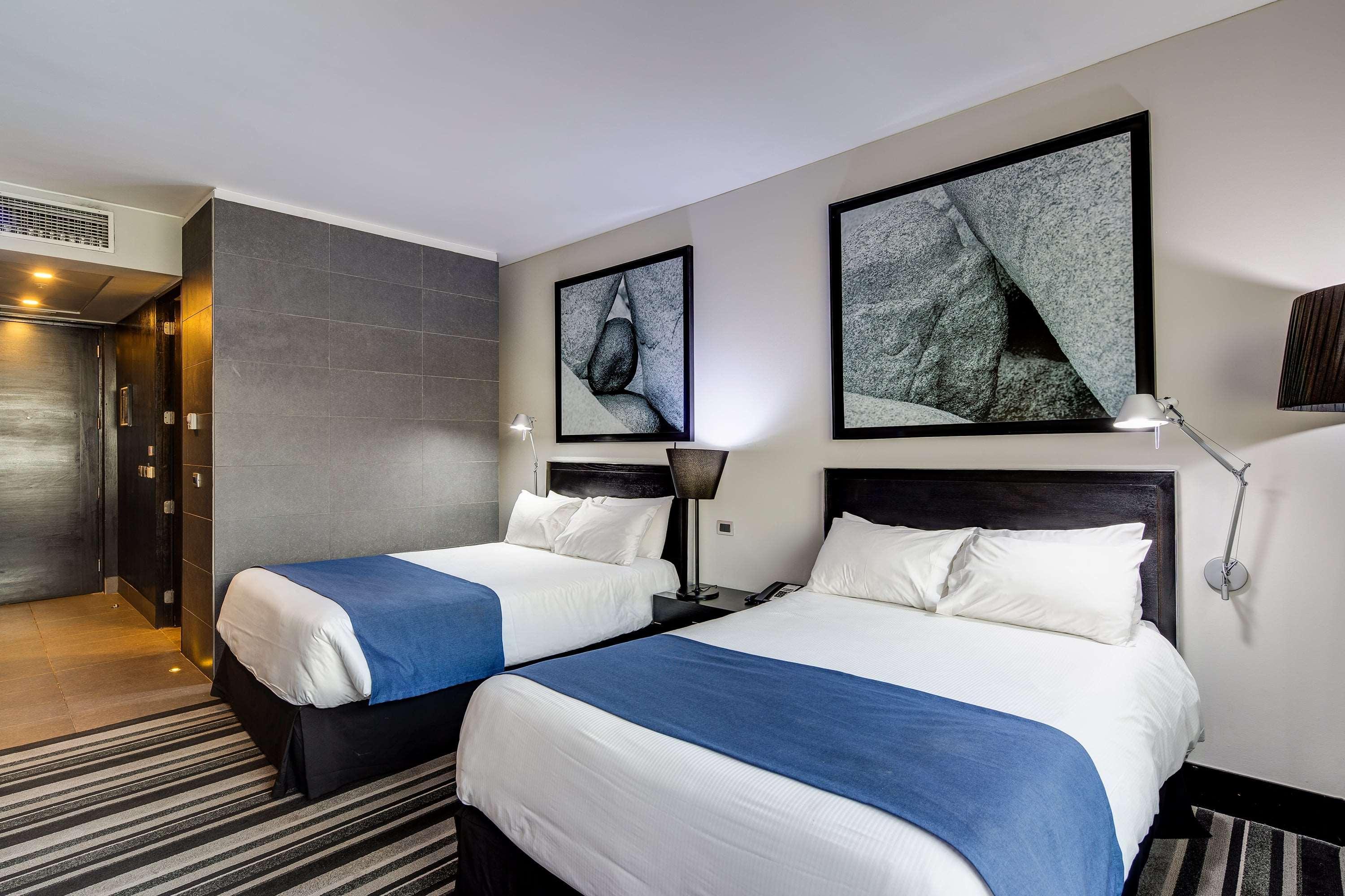 Wyndham Santiago Pettra Hotel Exterior photo A room at the hotel